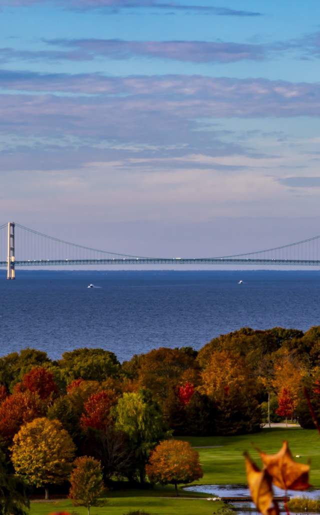 View of the Mackinac Bridge during fall color on Mackinac Island, located in the Upper Peninsula of Michigan
