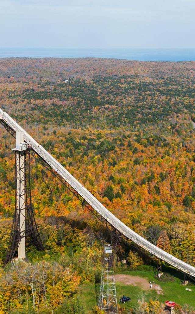 Aerial shot of fall color at Copper Peak, a ski flying hill located in the Upper Peninsula