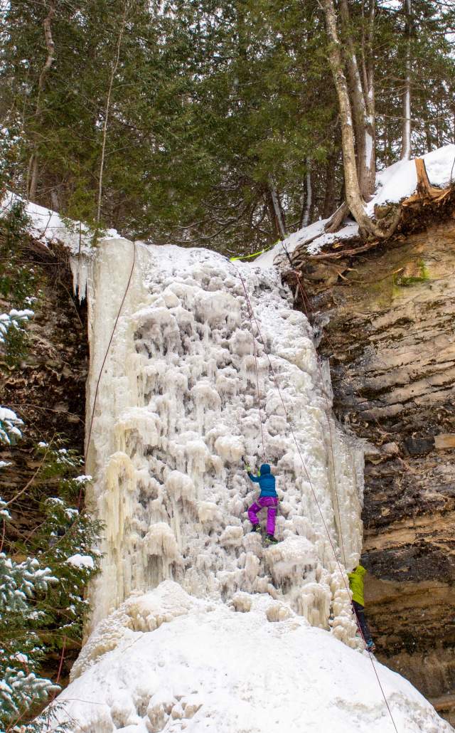 Ice climbing in winter in the Upper Peninsula of Michigan.