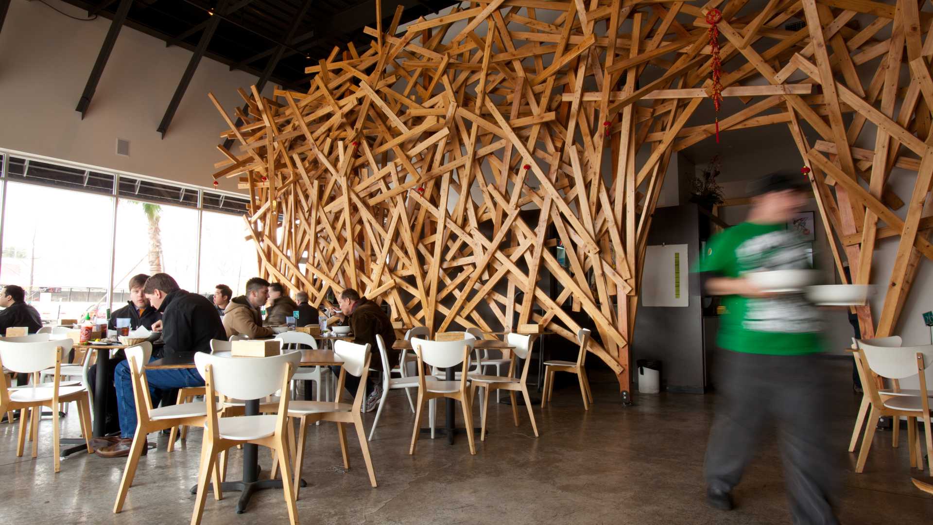 People dining in a Vietnamese restaurant in Houston.