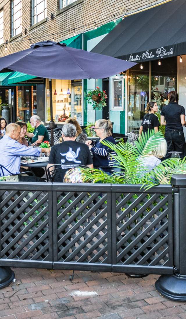 Image of people enjoying patio seating at Antonella's