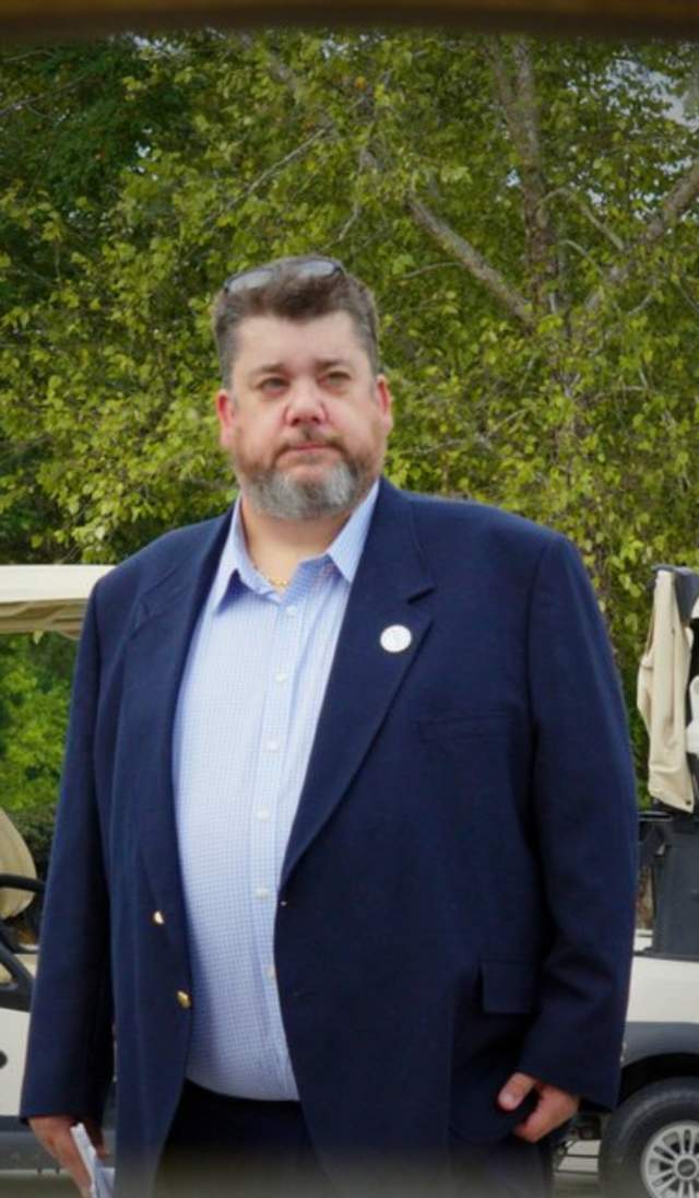 Robert Cox sales meeting at local golf course.