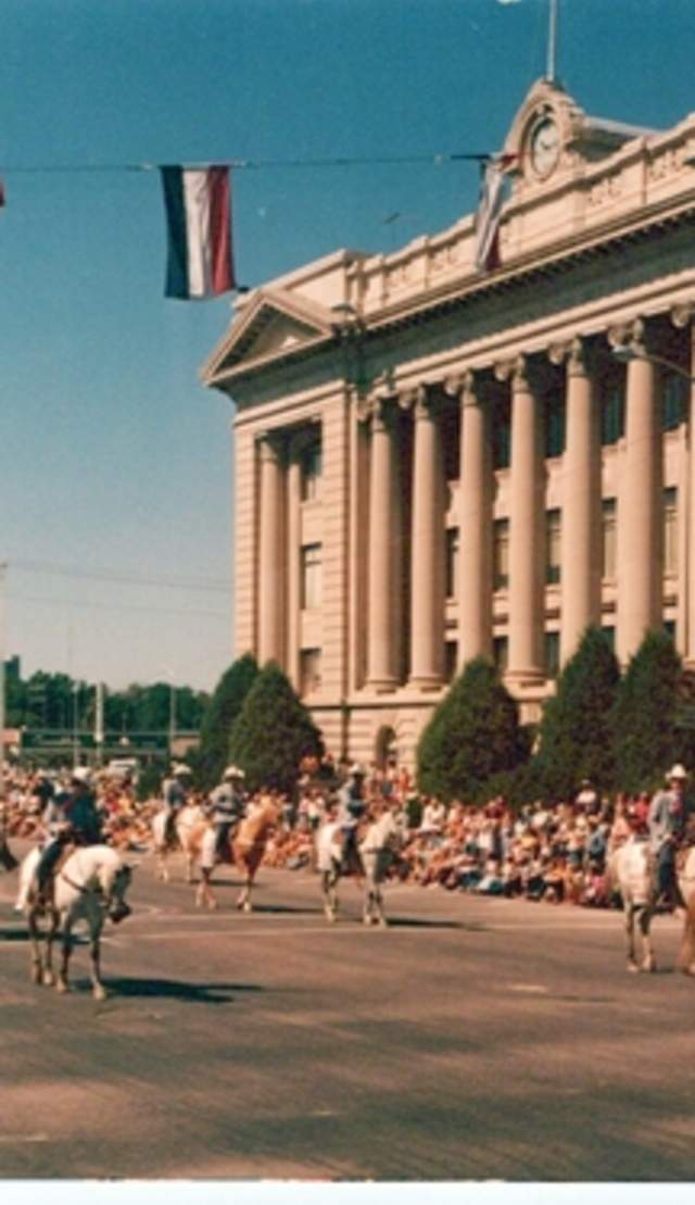 1974 - The Greeley Independence Stampede committee on horseback during the parade