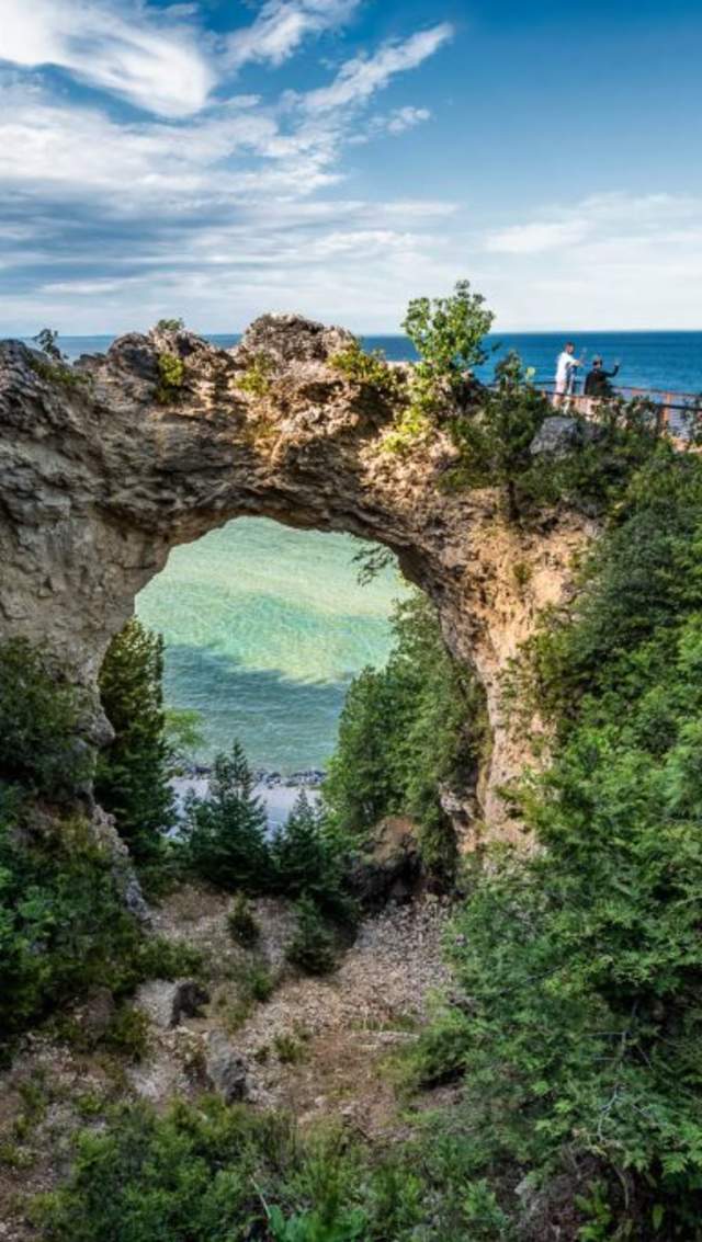 Mackinac Island’s legendary Arch Rock offers a spectacular view 140 feet above Lake Huron and the road below
