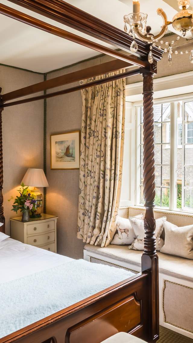 Bedroom at The Acorn Inn, Evershot, Dorset. Photo copyright The Red Carnation Hotel Collection