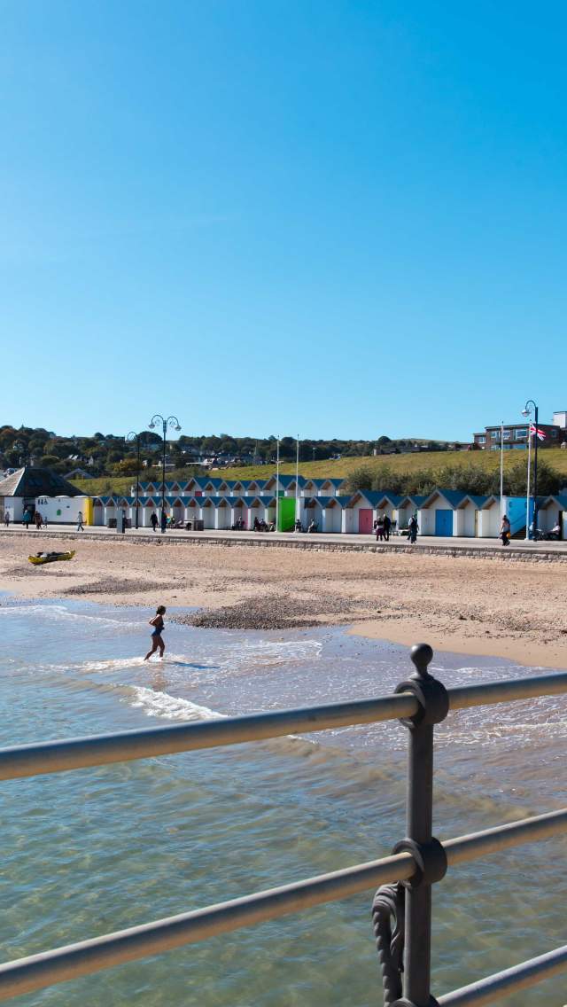 Swanage Beach and beach huts in Dorset