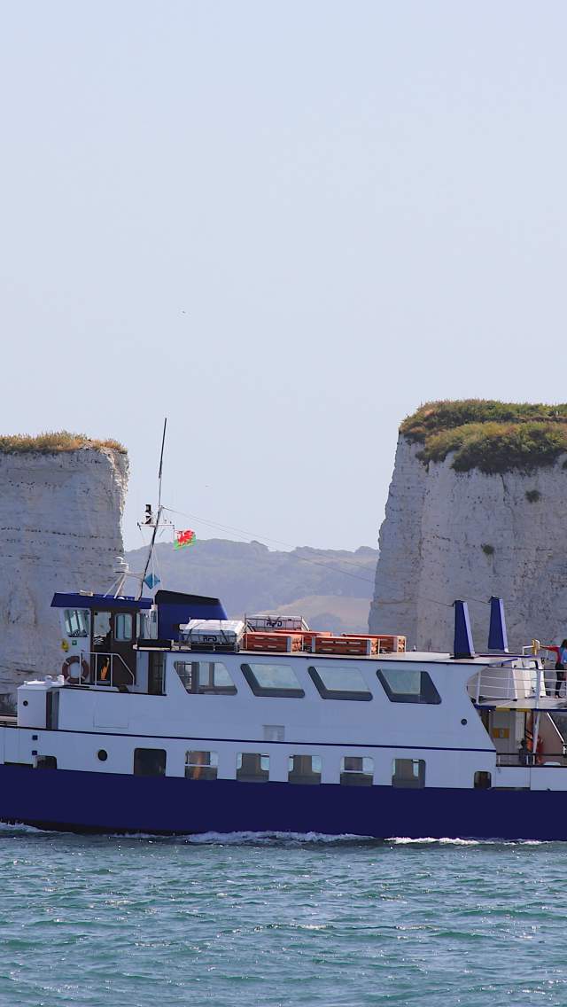 Solent Scene boat sailing past Old Harry Rocks in Dorset