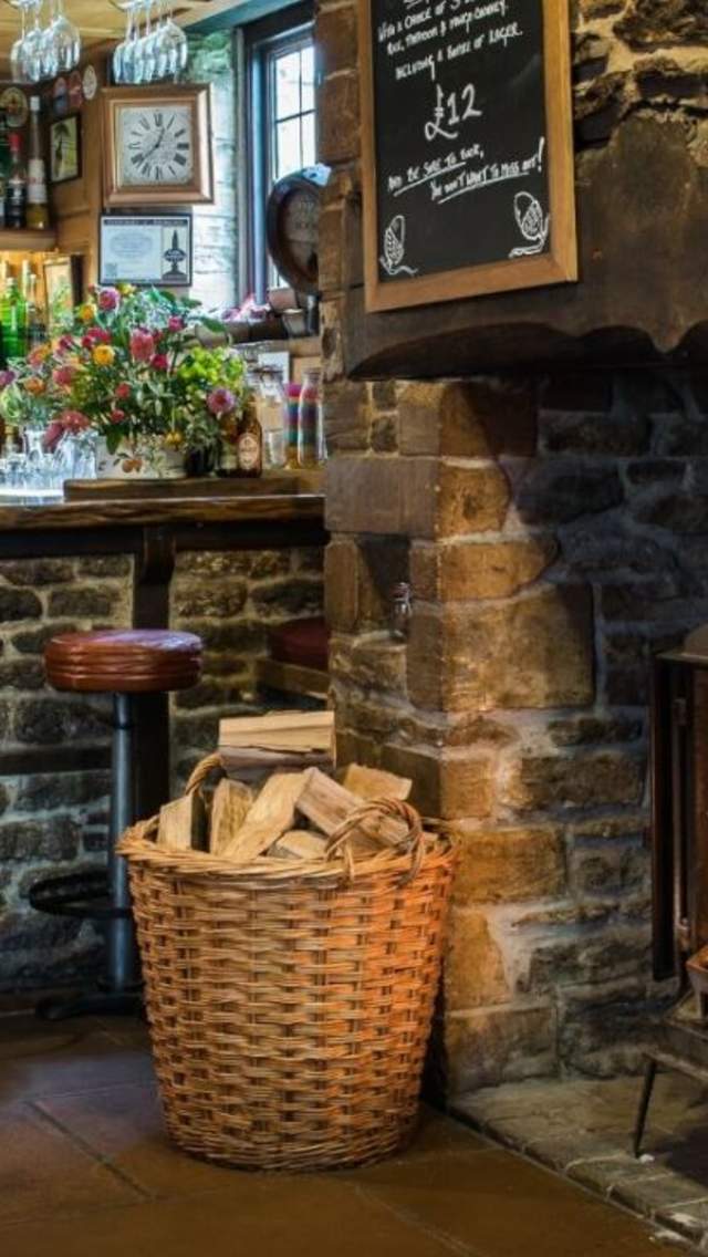 Bar with log fire at The Acorn Inn, Dorset