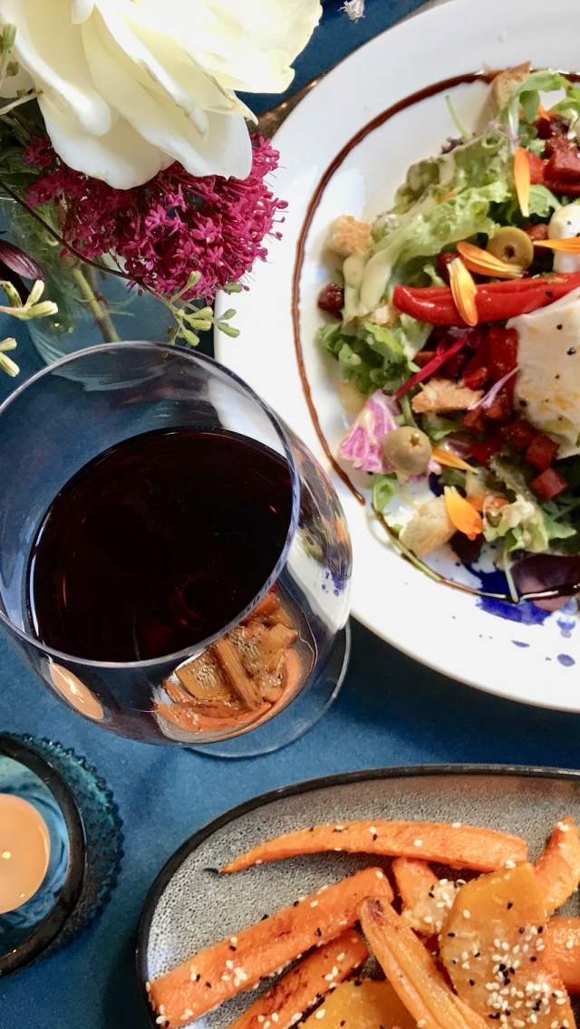 Salad, side and glass of wine from the Bistro at Keyneston Mill