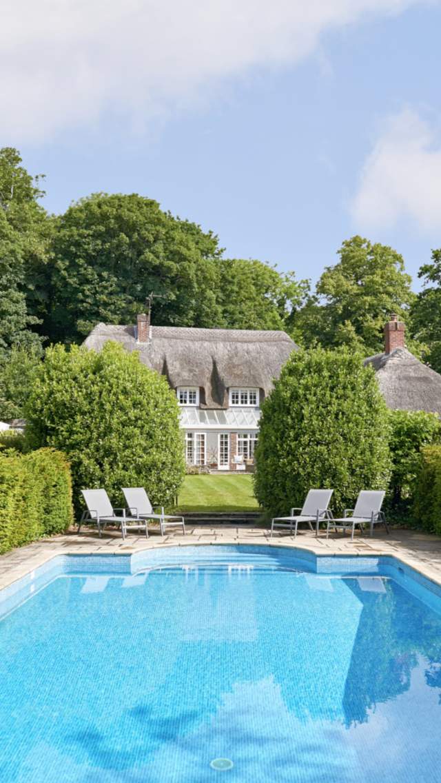 The outdoor swimming pool at Woodside Lodge holiday accommodation in East Lulworth, Dorset