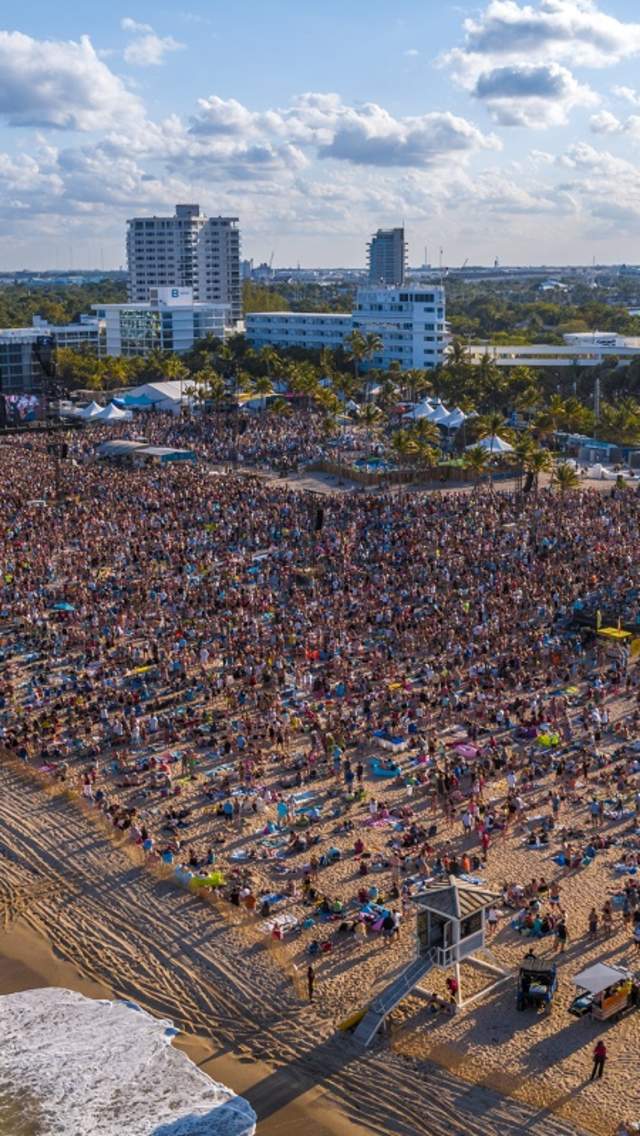 Aerial view of crowd at Tortuga Music Festival on Fort Lauderdale Beach taken looking southwest from the Atlantic Ocean