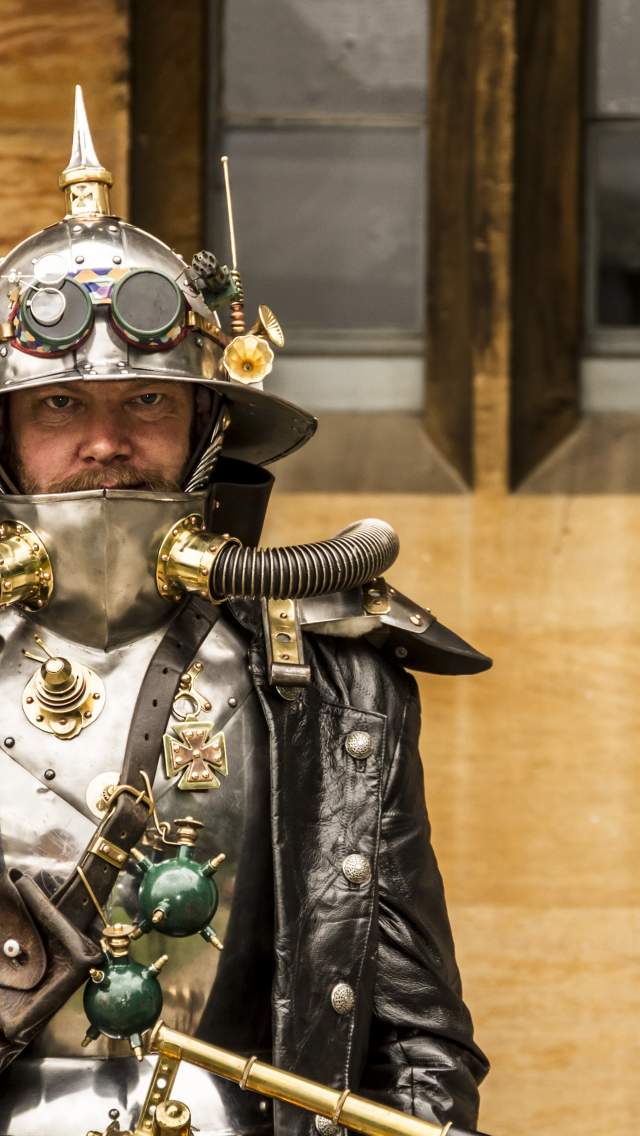 A man dressed up in a futuristic costume for Lincoln Steampunk Festival, outside Lincoln Crown Court.