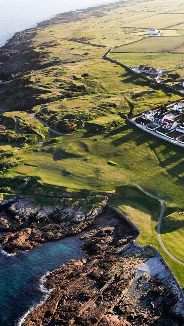 Aerial view overlooking the rocks and sea by the Ardglass Golf Club