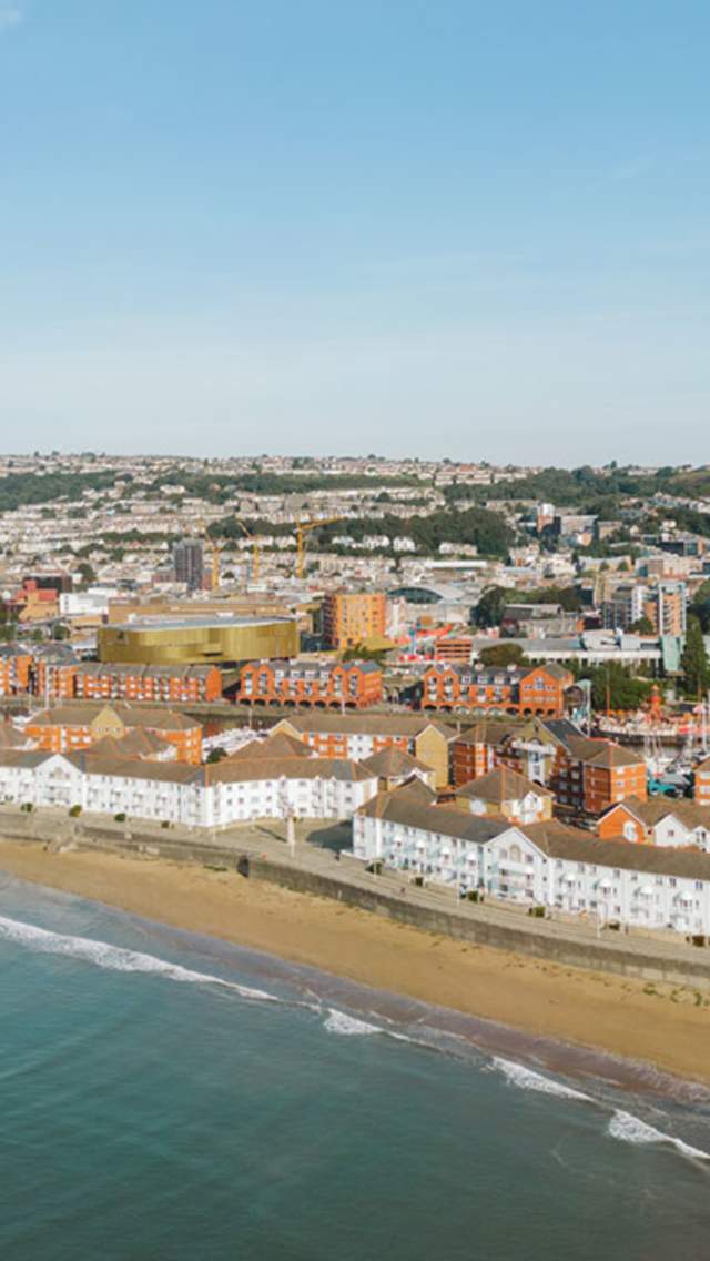 Arial view of Swansea city from the sea