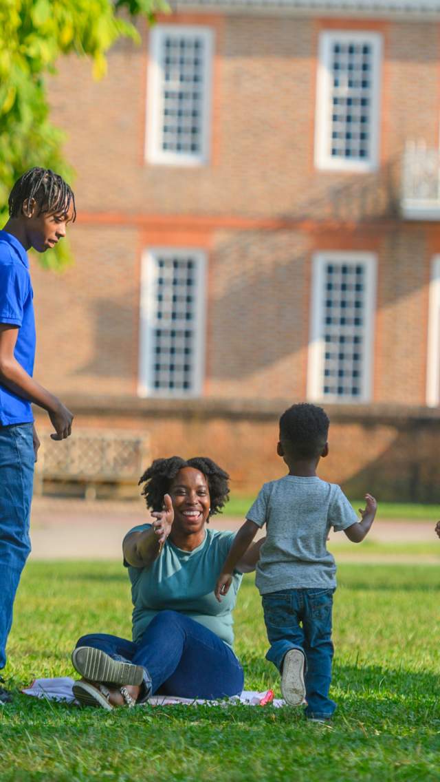 Family on the Governor's Palace Lawn