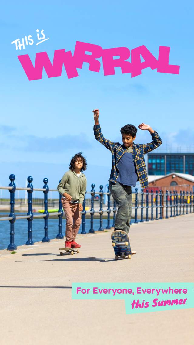 Two children skateboard on New Brighton seafront
