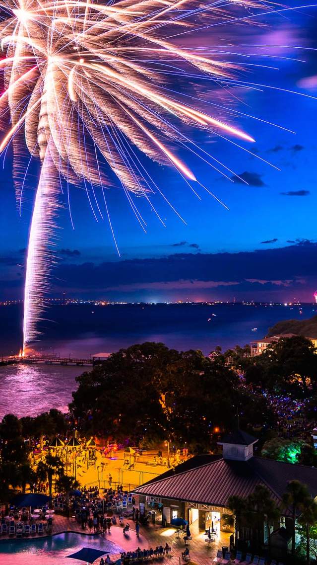 Fireworks light up the sky over the St. Simons Island Pier Village during the 4th of July Sunshine Festival