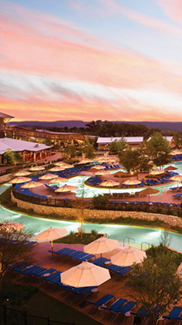 Overview of hotel lazy river and umbrellas