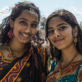 two women in traditional indian saris