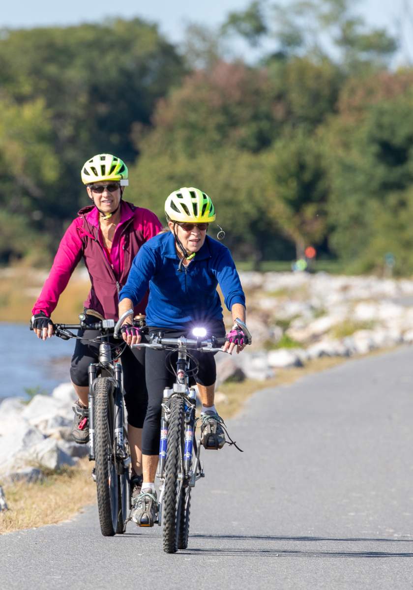 Cyclists on Delaware’s River Towns Ride along scenic Route 9 in Wilmington.