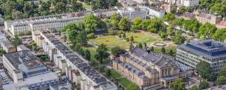 Aerial view of Cheltenham Town Hall, Imperial Square, Imperial Gardens and surrounding areas.