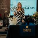 Woman promoting Rodney Strong wine at Flavors of the Peninsula event