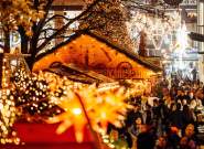 Christmas lights and stalls with Cabot in background - Credit James Bridle
