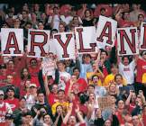 Maryland football fans hold up a spelling of the state name
