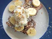 french toast with bananas on table
