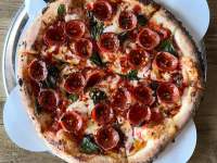 Pepperoni pizza on display