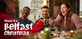 Group enjoying a Christmas dinner at Parisien