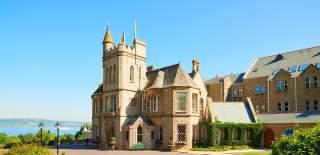 Culloden Hotel Exterior with Blue Sky
