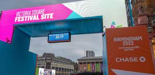 The finish line at the 2022 Commonwealth Games. Sign reads "Men's Marathon T54 Final"