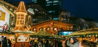 The bright lights of the Christmas market light up the night in Birmingham