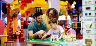 Mom, dad and son enjoying Legoland Birmingham