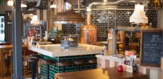 Seating and brewery at Brewhouse & Kitchen in Cotham, Bristol - credit Brewhouse & Kitchen