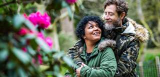 A couple in the grounds of Westonbirt Arboretum near Bristol in spring - credit Johnny Hathaway