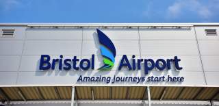 A white welcome sign at Bristol Airport  - Credit Bristol Airport