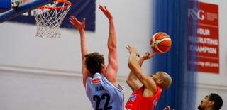 Bristol Flyers basketball players in a match against the Manchester Giants at SGS College Bristol - credit JMP Photography