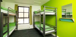 A green room in Bristol YHA with bunkbeds - Credit Matt Selby