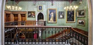 Hallway and central staircase at Tyntesfield House, near Bristol - credit Bob Fowler
