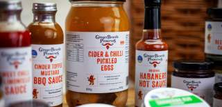 Bottles of hot sauce and jar of pickled eggs - credit GingerBeard's Preserves