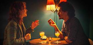 Couple drinking cocktails at The Granary Club cocktail bar - credit The Granary