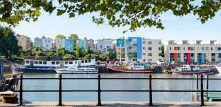 House boats and houses in Bristol harbourside - credit Bristol BID