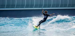 Person surfing at The Wave - credit The Wave
