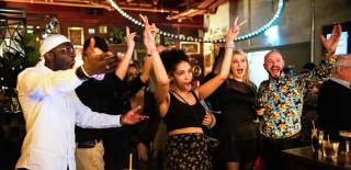 Group of people celebrating - credit Flight Club