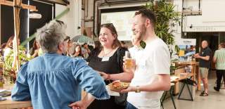 People talking at food and drink event - credit Charlotte Tolhurst