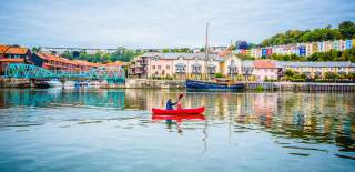 Person paddling in Bristol harbour by Hotwells - credit David Page