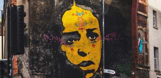 Yellow Faced Lady on Stokes Croft by Stinkfish -  Credit Morgane Bigault