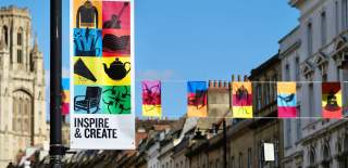 'Inspire & Create' banner on Park Street in Bristol - credit Bristol BID